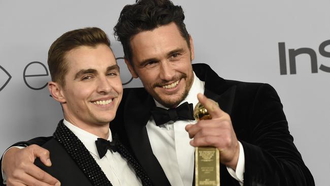 James Franco with his brother Dave after winning the award for Best Performance by an Actor in a Motion Picture at the Golden Globes.