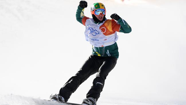 Jarryd Hughes of Australia celebrates his silver medal in Men's Snowboard Cross at the PyeongChang 2018 Winter Olympic Games last month. Picture: Dan Himbrechts