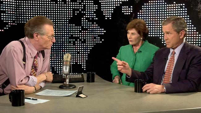 Larry King interviews George and Laura Bush in 2000. Picture: AFP