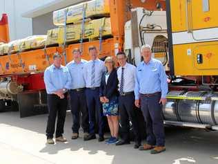 FIRST SHIPMENT: Wagners CEO Cameron Coleman, CFT general manager Michael Kemp, Transport Minister Mark Bailey, Department of Transport and Main Roads' Regional Director for Downs South West, Kym Murphy, acting director of Department of Transport and Main Roads, Matt Longland and Wagners chairman, Denis Wagner at the first shipment of composite fibre technology to the United Kingdom. Picture: Wagners