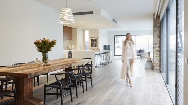 The open-plan living, dining and kitchen zone of their Newtown home. Credit: Marija Ivkovic.