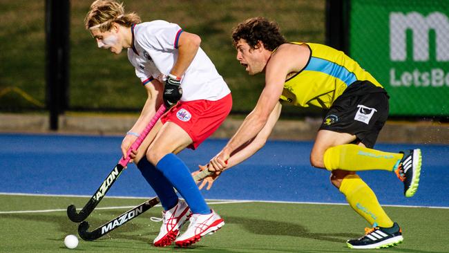 Jack Holland and Todd Kitto during the Men’s Hockey SA Premier League grand finals at MATE Stadium. Picture: Morgan Sette