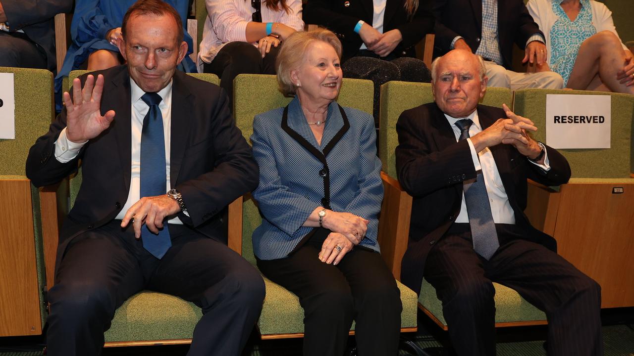 Former prime ministers Tony Abbott and John Howard, with Janette Howard in the middle. Picture: Jason Edwards