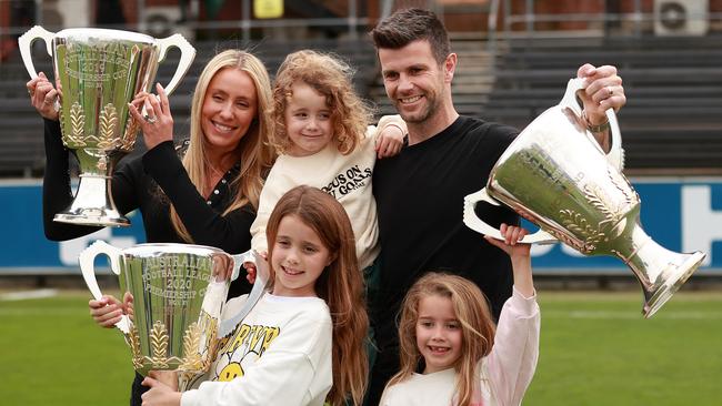 Trent Cotchin poses for a portrait with his wife Brooke and their children Parker, Harper and Mackenzie after announcing his retirement from AFL. Picture: Kelly Defina