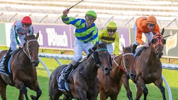 Steven Parnham celebrates as Bustler wins the Group 1 Railway Stakes at Ascot. Picture: Western Racepix