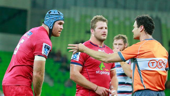 MELBOURNE, AUSTRALIA - APRIL 03: James Horwill (L) of the Reds is sent off by referee Matt O'Brien as Reds captain James Slipper looks on during the round eight Super Rugby match between the Rebels and the Reds at AAMI Park on April 3, 2015 in Melbourne, Australia. (Photo by Scott Barbour/Getty Images)