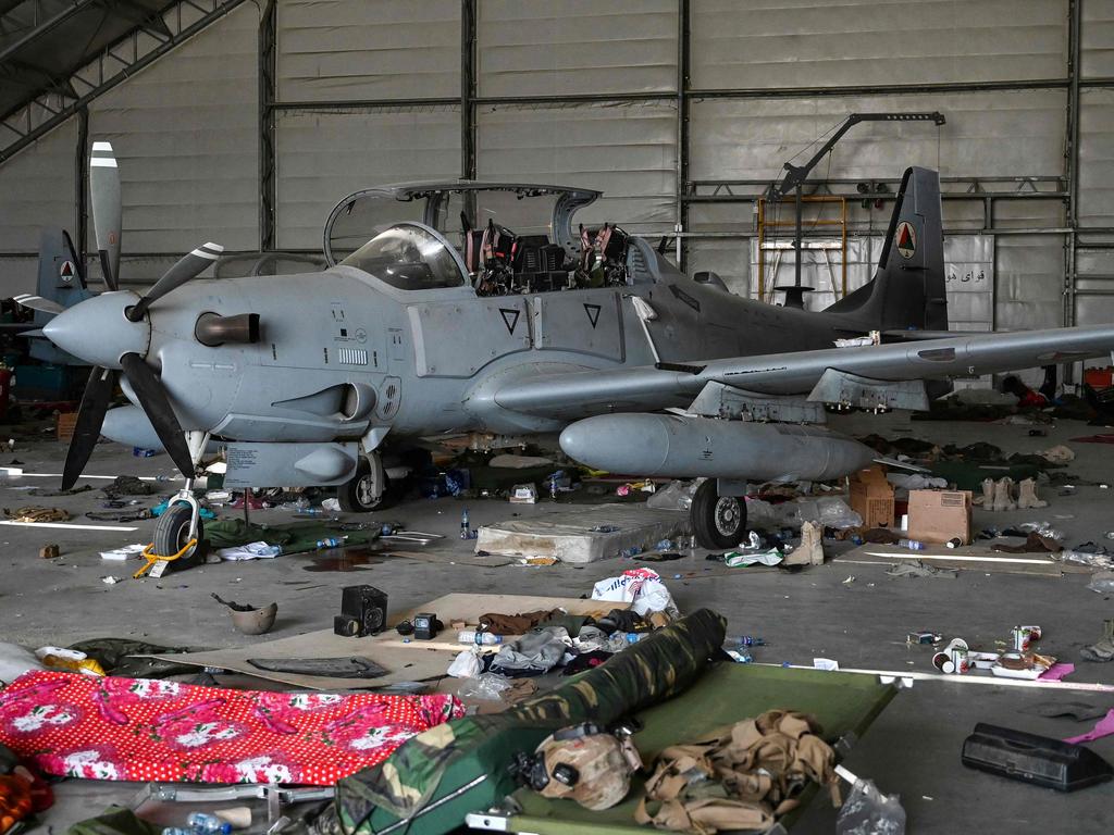 A Afghan Air Force A-29 attack aircraft is pictured inside a hangar at the airport in Kabul. Picture: WAKIL KOHSAR / AFP