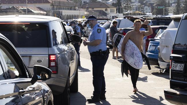 NSW police conduct public health order compliance checks at Bondi Beach in August 2021 during the Covid pandemic.