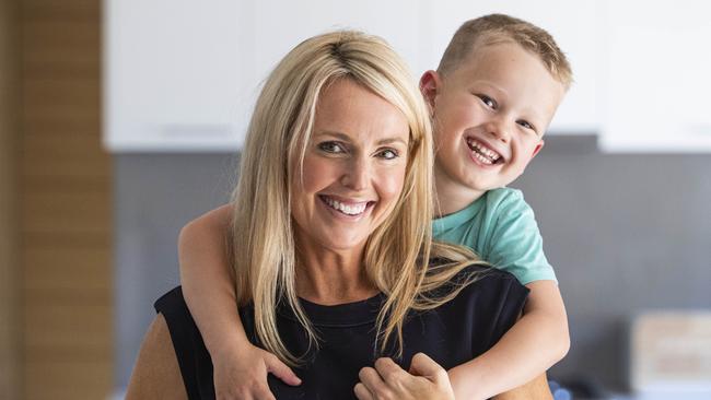 Psychologist Natalie Flatt, with son Xavier, 5, says the $10m female entrepreneurs fund is a ‘beautiful reintroduction’. Picture: Aaron Francis