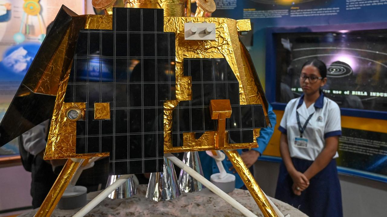 School students look at a model of Chandrayaan-3's Lander Module (LM) at a technical museum in Kolkata. Picture: Dibyangshu Sarkar/AFP
