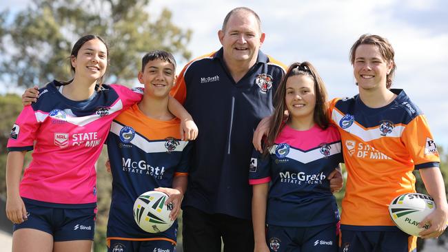 Daryn Wilson, Club President of All Saints Toongabbie Tigers, is backing the plan to boost funding for suicide prevention, which will engage with teams and coaches. Pictured (from left) Leila Black, 15, Joseph Black, 12, Daryn Wilson, Mialee Serra, 12 and Bailey Clark, 16. Picture: David Swift