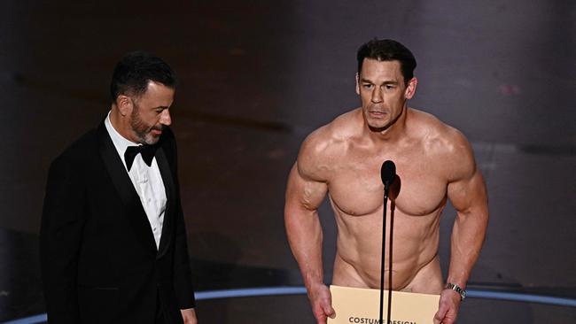 John Cena presented the award for Best Costume Design onstage during the 96th Annual Academy Awards. Photo by Patrick T. Fallon / AFP.