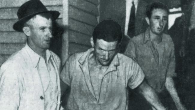 Police recapture Arthur “Slim” Halliday (centre) in 1946.