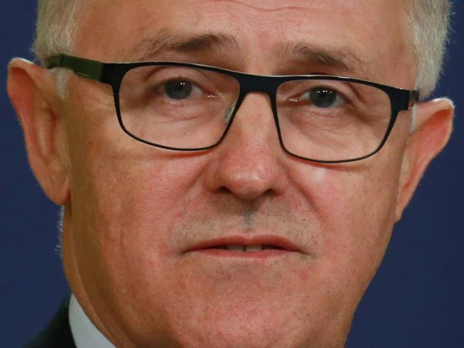 The Minister for Communications, Malcolm Turnbull MP and NBN Co Limited CEO Bill Morrow and Telstra CEO David Thodey hold a press conference at the Commonwealth Parliamentary Office in Sydney. Pic - Britta Campion