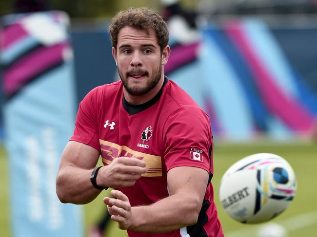 (FILES) In this file photo taken on September 15, 2015, Canada's centre Tyler Ardron takes part in a training session at Swansea university, ahead of the 2015 Rugby Union World Cup. - Ardron will compete with Canada in pool B of the 2019 Rugby World Cup in Japan, scheduled from September 20 to November 2, 2019. (Photo by Damien MEYER / AFP)