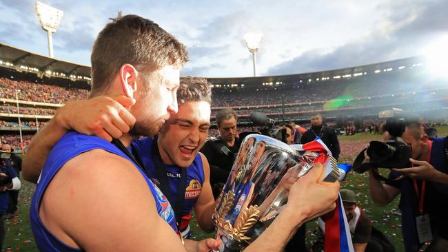 Matthew Boyd and Luke Dahlhaus have a special moment with the premiership cup. Picture: Alex Coppel