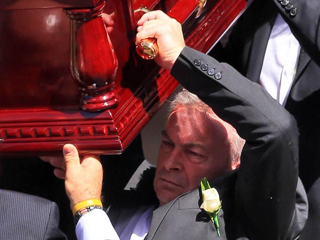 Borce Ristevski carries his wife’s coffin after her remains were found in bushland at Mt Macedon. Picture: Aaron Francis/The Australian