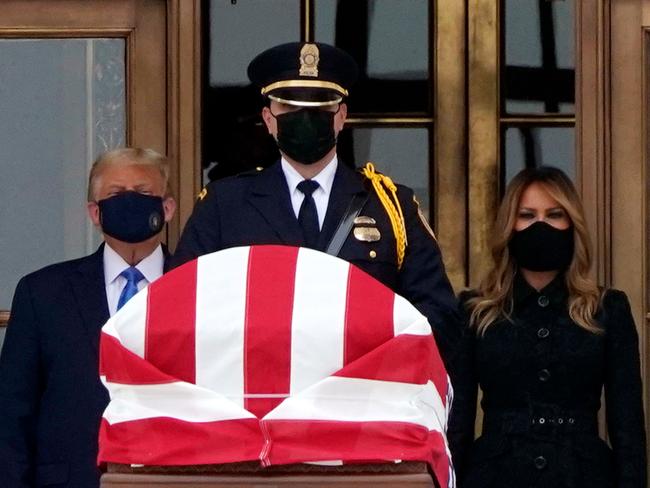 US President Donald Trump and First Lady Melania Trump pay their respects to US Supreme Court Justice Ruth Bader Ginsburg. Picture: AFP