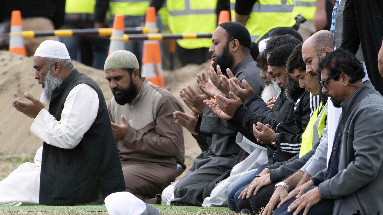 Mourners pray while attending the funeral of Haji Mohammed Daoud Nabi, a victim of New Zealand's twin mosque attacks, at Memorial Park cemetery in Christchurch on March 21, 2019. Picture: Marty Melville / AFP.