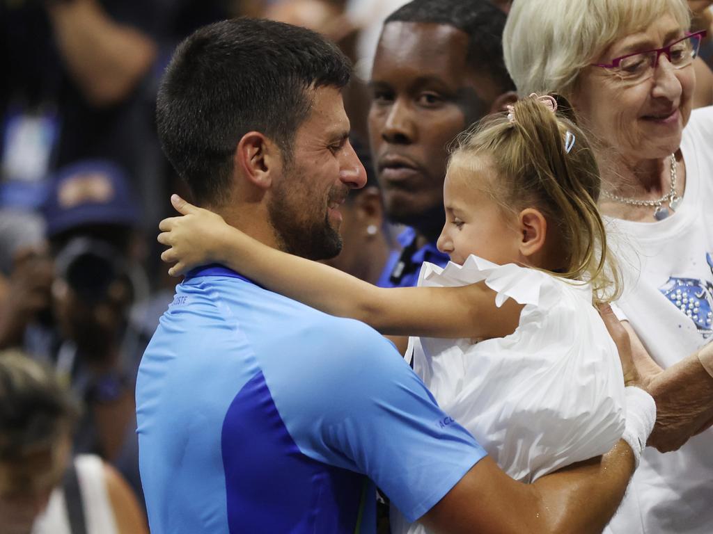 NEW YORK, NEW YORK - SEPTEMBER 10: Novak Djokovic of Serbia celebrates with daughter Tara after defeating Daniil Medvedev of Russia during their Men's Singles Final match on Day Fourteen of the 2023 US Open at the USTA Billie Jean King National Tennis Center on September 10, 2023 in the Flushing neighborhood of the Queens borough of New York City. (Photo by Matthew Stockman/Getty Images)