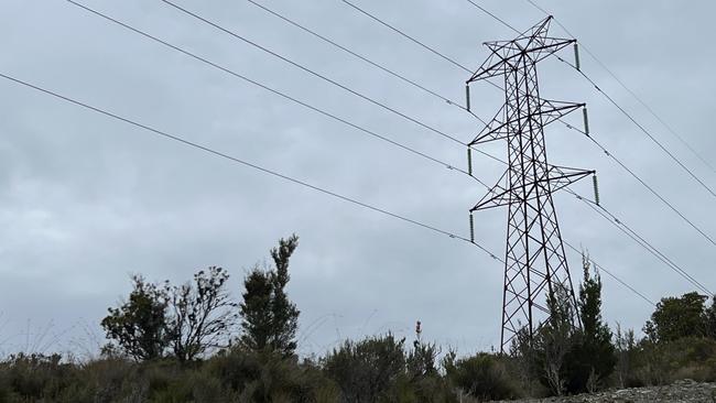 Hydro electricity transmission lines near Lake Pedder. Picture: Philip Young