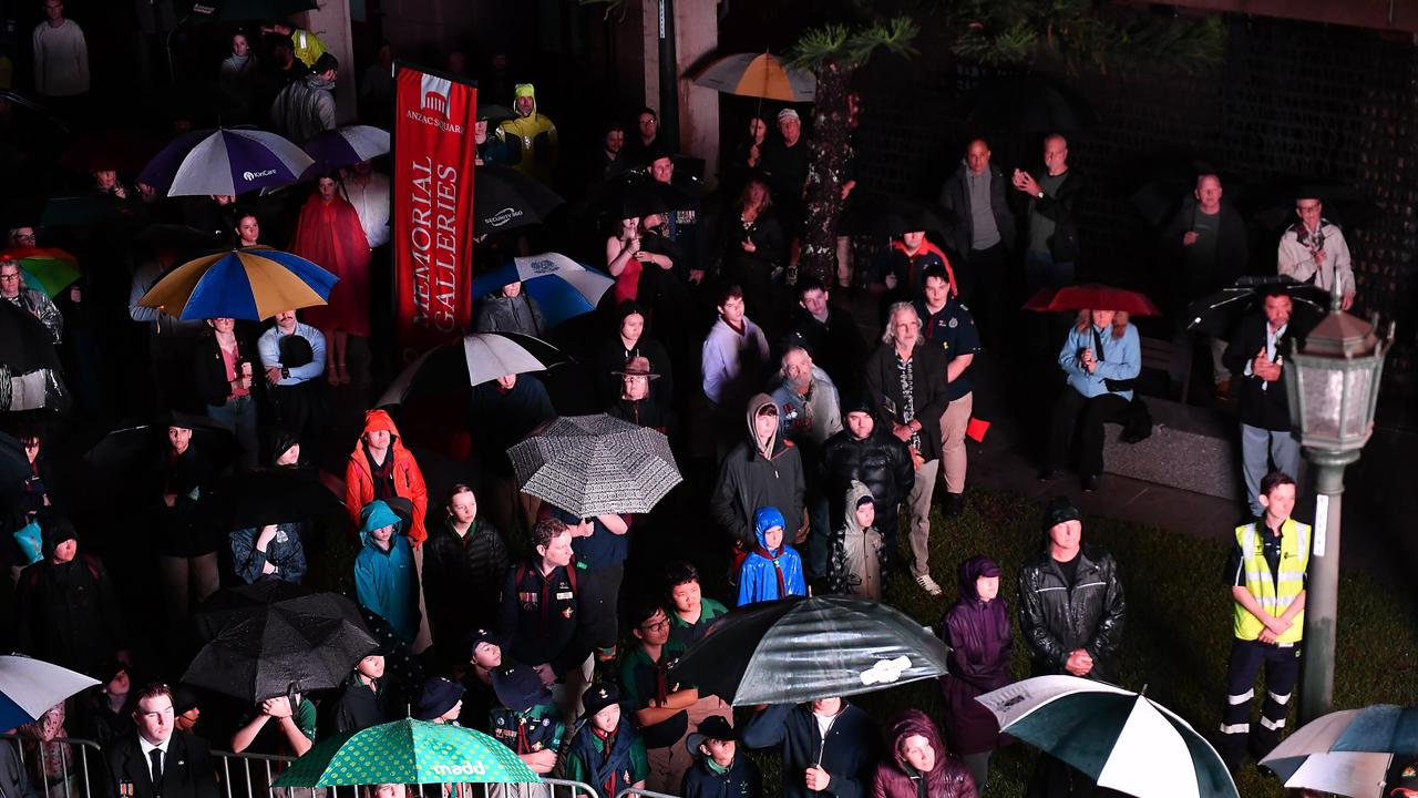 Large crowds braved the rain. Anzac Day dawn service at the Brisbane City Shrine of Remembrance. Picture: NewsWire / John Gass
