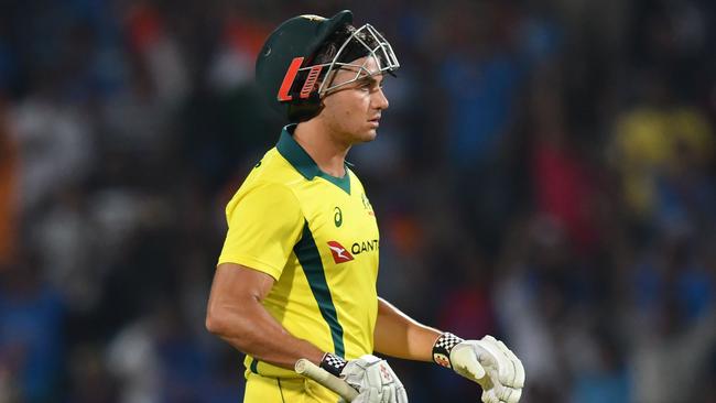 Australia batsman Marcus Stoinis walks back towards pavilion after his wicket during the second one-day international (ODI) cricket match between India and Australia.