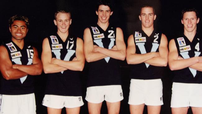 Jordan Barham (centre) with other Calder Cannons team mates from the 2001 Victorian under-18 metro side.