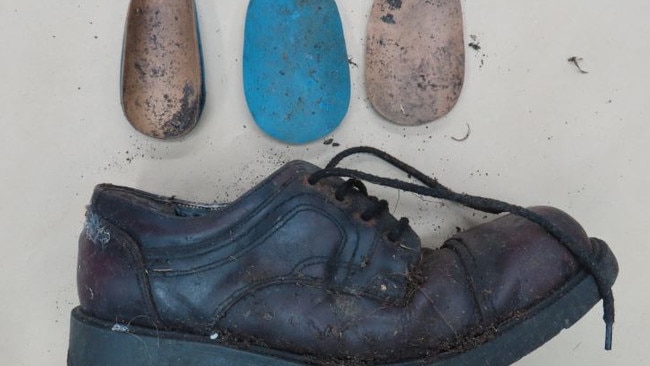 Humans remains have been found near Clifton Beach on Tasmania's South Arm Peninsula. Shoes and orthopaedic inserts belonging to the person. Picture: Tasmania Police.