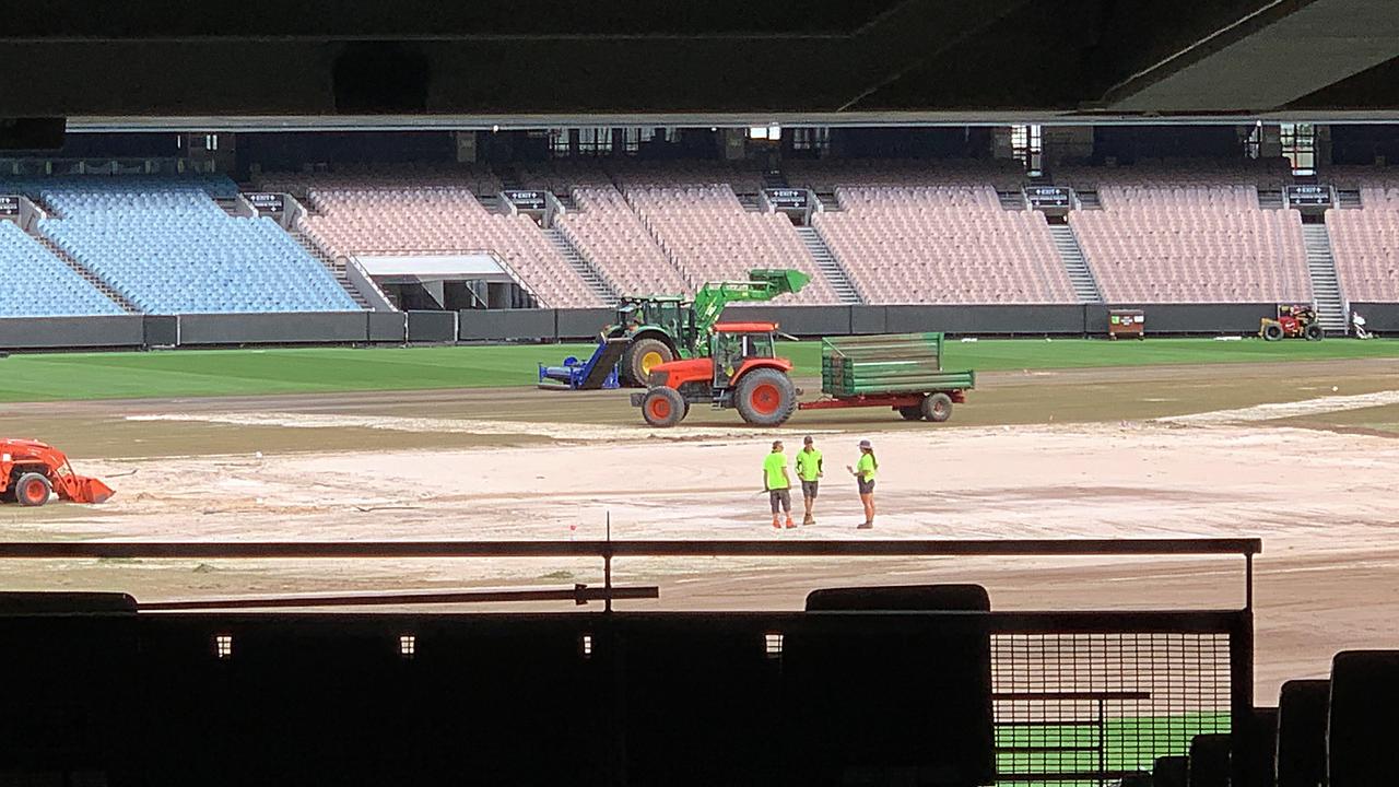 Parts of the MCG turf will be replaced ahead of the AFL round 1. Tractors and workmen busy ripping up and replacing the MCG turf. Picture: David Caird