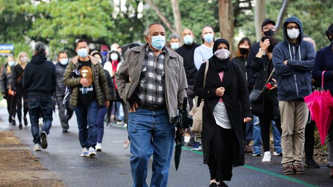 Long queues of people at the Olympic Park Vaccination Hub in Sydney. Picture: NCA NewsWire / Gaye Gerard