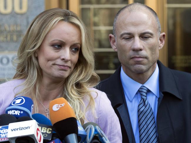 Stormy Daniels, with lawyer Michael Avenatti, claims she had a sexual tryst with Mr Trump more than a decade ago. Picture: Mary Altaffer/AP