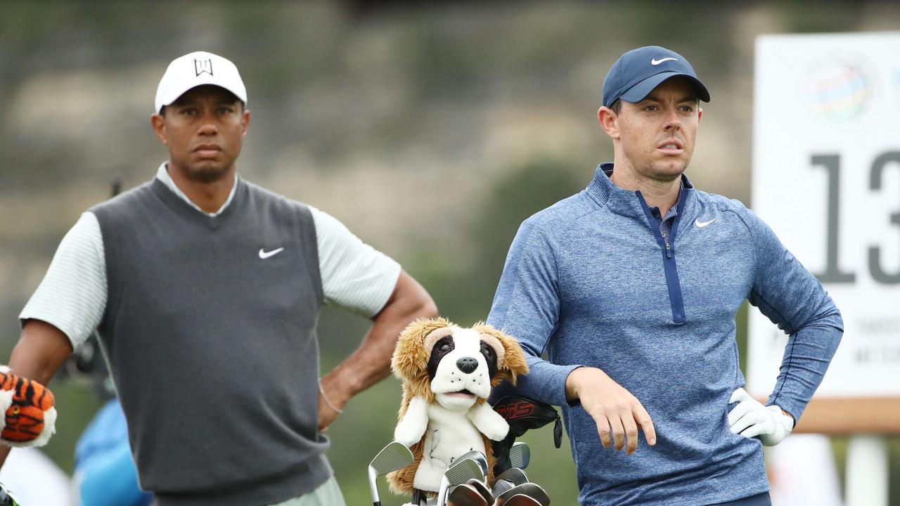 AUSTIN, TEXAS - MARCH 30: Tiger Woods of the United States and Rory McIlroy of Northern Ireland stand on the 13th tee during the fourth round of the World Golf Championships-Dell Technologies Match Play at Austin Country Club on March 30, 2019 in Austin, Texas. Ezra Shaw/Getty Images/AFP == FOR NEWSPAPERS, INTERNET, TELCOS &amp; TELEVISION USE ONLY ==