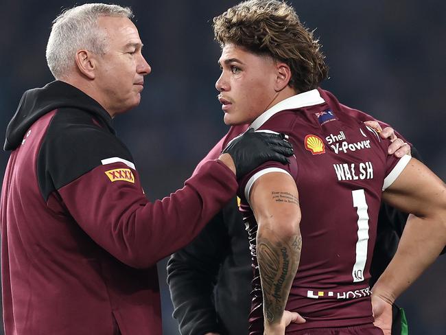 Reece Walsh is attended to by medical staff after been knocked out by Joseph-Aukuso Suaalii. Picture: Getty Images