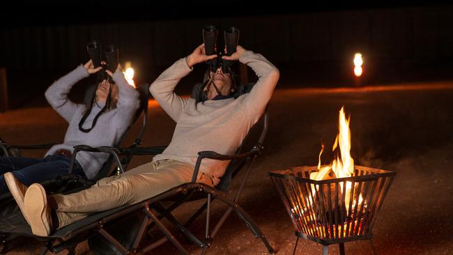 Couple enjoying a sky show at Outback Astronomy, Broken Hill.