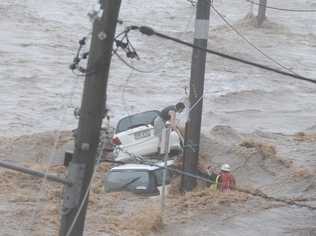 Flood water tears through Toowoomba. Picture: Nev Madsen