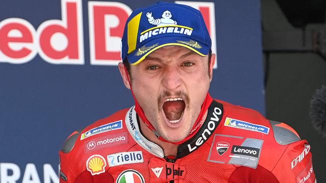 Ducati Lenovo Team's Australian rider Jack Miller celebrates on the podium after winning the MotoGP race of the Spanish Grand Prix at the Jerez Circuit in Jerez de la Frontera on May 2, 2021. (Photo by PIERRE-PHILIPPE MARCOU / AFP)