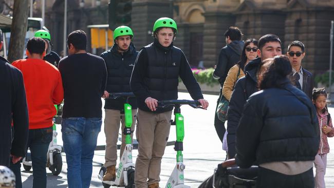 People riding e-scooters must always wear a helmet. Picture: NewsWire /Brendan Beckett