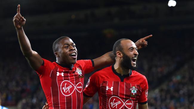 Michael Obafemi and Natahn Redmond elebrate together.