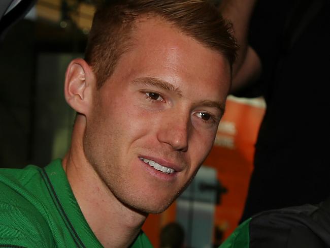 Socceroos Westfeild appearance, Pitt St , Sydney 22nd May, Oliver Bozanic signing autographs Pic : George Salpigtidis