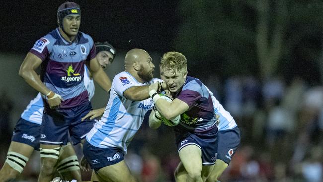 Isaac Lucas takes on the Waratahs defence in a Super Rugby trial in Dalby. QRU Media