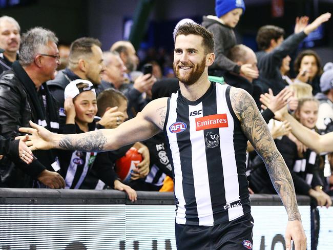 MELBOURNE, AUSTRALIA - MAY 25:  Jeremy Howe of the Magpies celebrates the win with fans during the round 10 AFL match between the Collingwood Magpies and the Western Bulldogs at Etihad Stadium on May 25, 2018 in Melbourne, Australia.  (Photo by Michael Dodge/Getty Images)