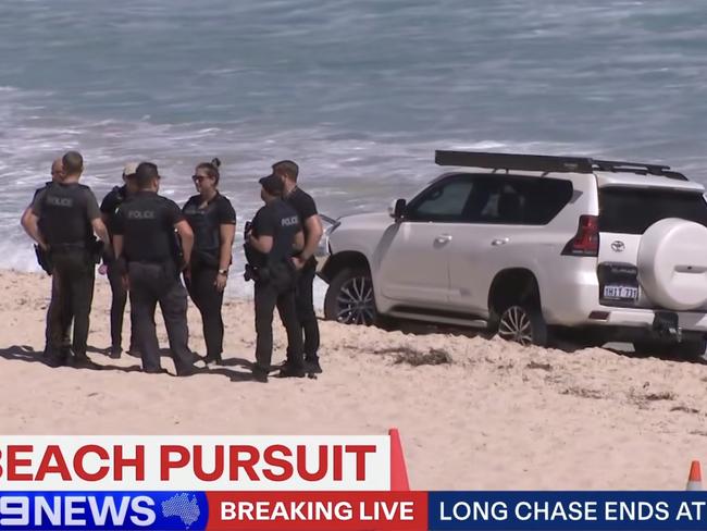 A police chase through Perth's northern suburbs has ended on Scarborough Beach where a man allegedly tried to make his getaway in the sea., Picture: 9news