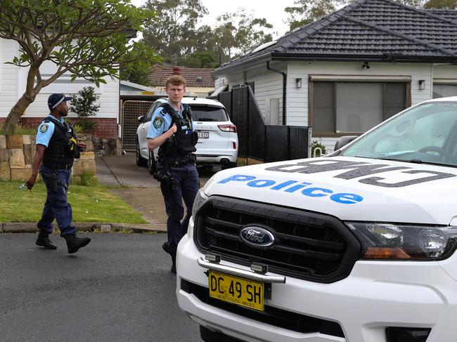 SYDNEY, AUSTRALIA: Newswire Photos: DECEMBER 24 2023: Police are seen outside a home; 8 Sybil St in Guildford in Sydney after a man was kidnapped from his home in the early hours of today. Two burnt out cars have been found by Police on Naying Drive in Pemulwuy and Woodpark Road in Smithfield believed to be linked to this home invasion in Sydney's West overnight. Photo by: NCA Newswire/ Gaye Gerard