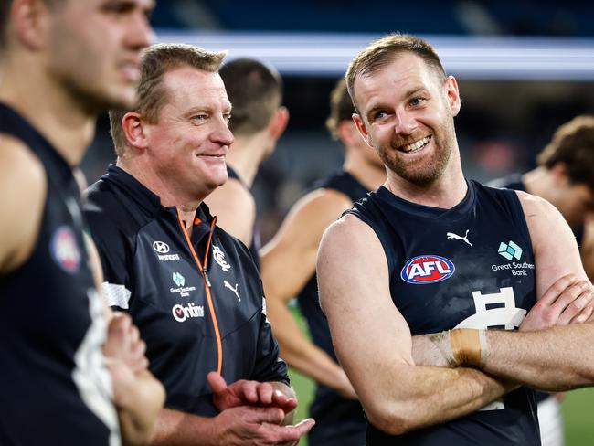 MELBOURNE, AUSTRALIA - JULY 28: Michael Voss, Senior Coach of the Blues and Sam Docherty of the Blues are seen during the 2023 AFL Round 20 match between the Collingwood Magpies and the Carlton Blues at The Melbourne Cricket Ground on July 28, 2023 in Melbourne, Australia. (Photo by Dylan Burns/AFL Photos via Getty Images)