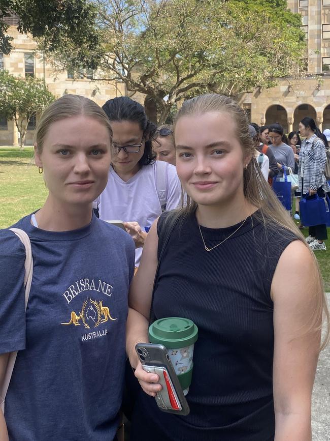 UQ Students from Norway Sunniva Burgas and Kamilla Eggen waiting in long line at the market. Photo: Rose Innes