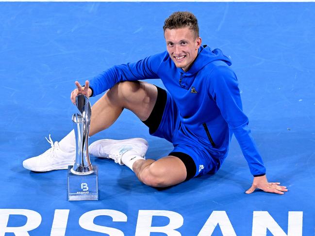 BRISBANE, AUSTRALIA - JANUARY 05: Jiri Lehecka of the Czech Republic celebrates victory after the MenÃ¢â¬â¢s Finals match against Reilly Opelka of the USA during day eight of the 2025 Brisbane International at Pat Rafter Arena on January 05, 2025 in Brisbane, Australia. (Photo by Bradley Kanaris/Getty Images)