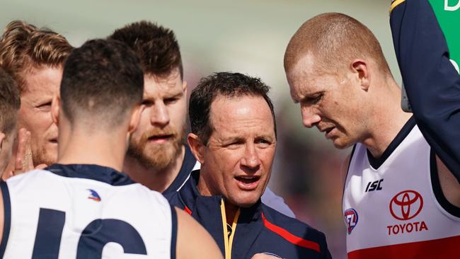 Don Pyke speaks to his team at quarter time after the first-term Dogs onslaught. Picture: AAP Image/Scott Barbour