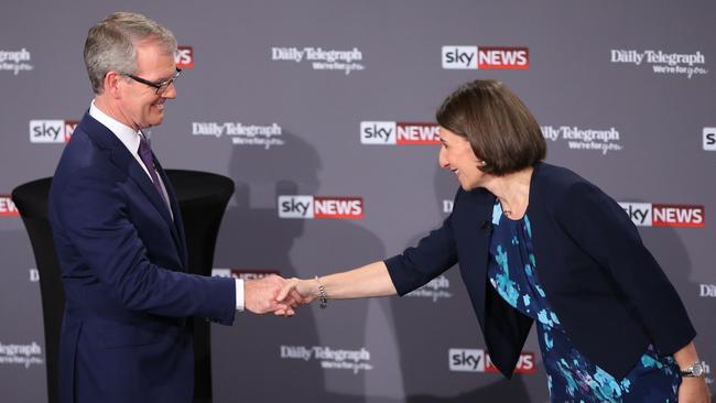 Mr Daley and Ms Berejiklian shake hands before starting. Picture: Damian Shaw