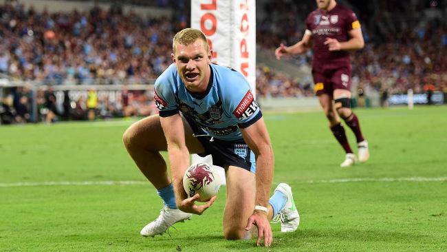 TOWNSVILLE, AUSTRALIA - JUNE 09:  Tom Trbojevic of the Blues scores a try during game one of the 2021 State of Origin series between the New South Wales Blues and the Queensland Maroons at Queensland Country Bank Stadium on June 09, 2021 in Townsville, Australia. (Photo by Ian Hitchcock/Getty Images)